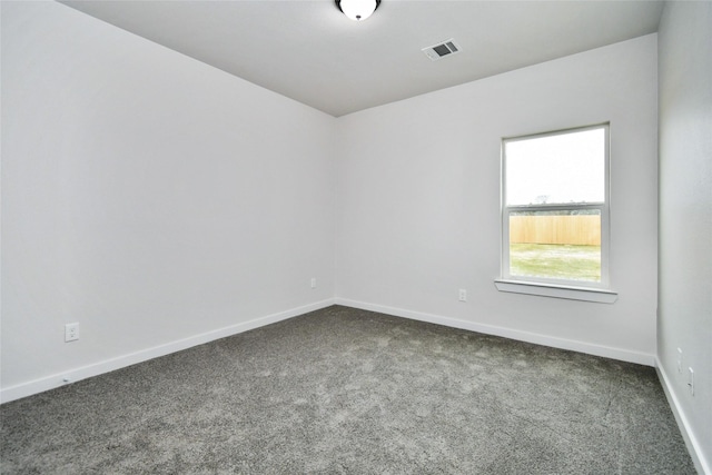 empty room featuring carpet flooring