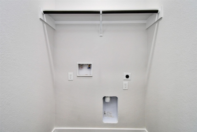 washroom featuring hookup for a gas dryer, washer hookup, and hookup for an electric dryer