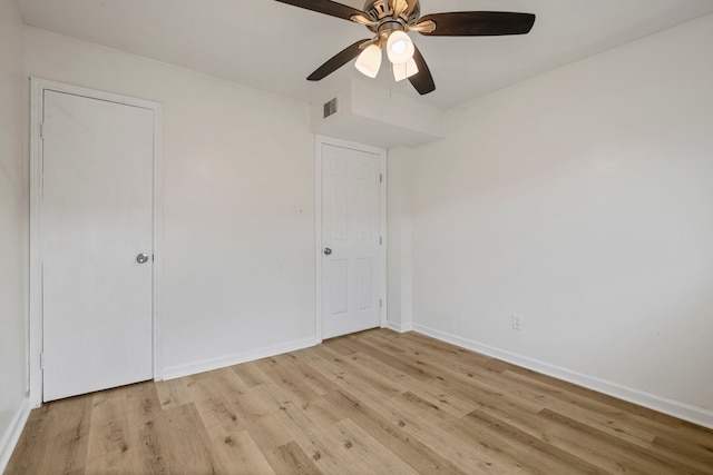 unfurnished bedroom featuring ceiling fan and light hardwood / wood-style flooring