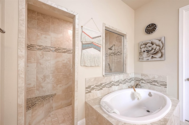 bathroom featuring separate shower and tub