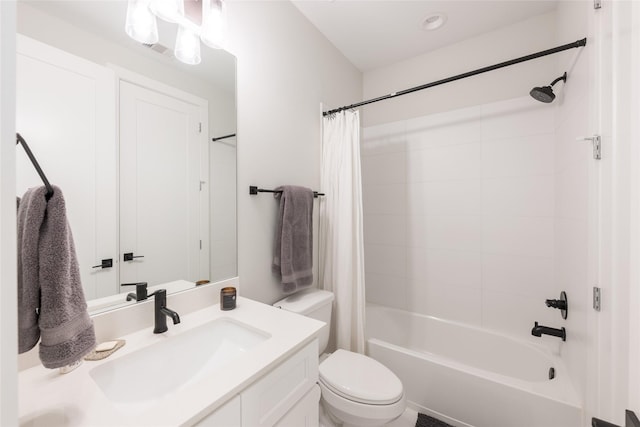 full bathroom with shower / bath combo with shower curtain, vanity, and toilet