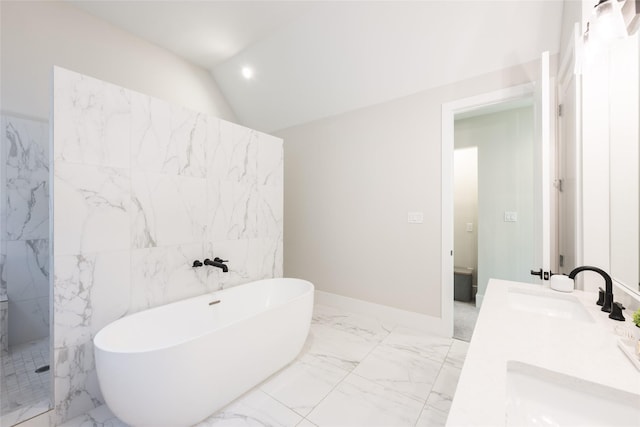 bathroom featuring plus walk in shower, vanity, tile walls, and lofted ceiling