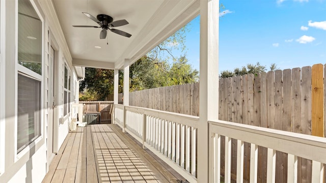 wooden terrace with ceiling fan