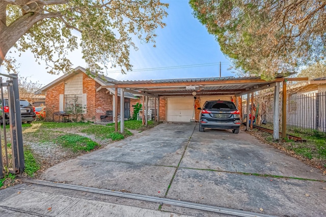 view of front of house featuring a garage and a carport