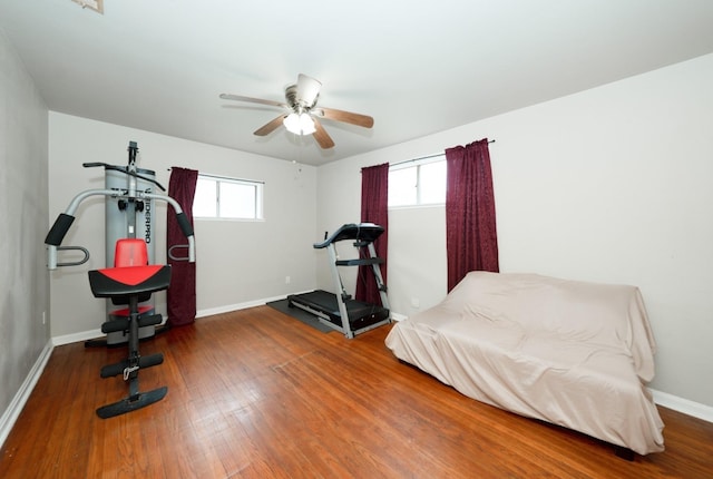 bedroom featuring ceiling fan and hardwood / wood-style flooring