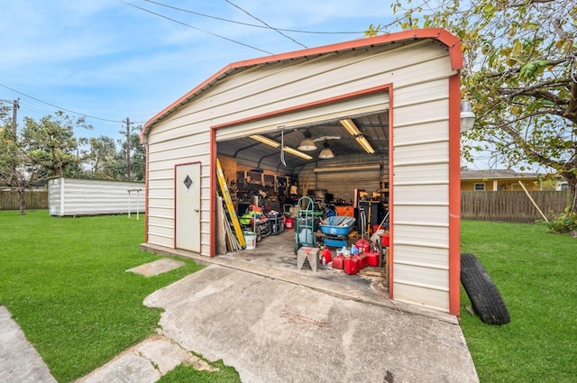 view of outbuilding with a yard