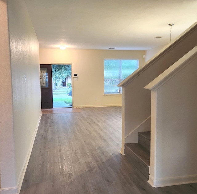 hallway featuring hardwood / wood-style floors