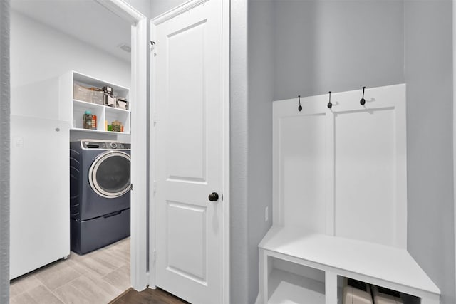 laundry room featuring washer / dryer