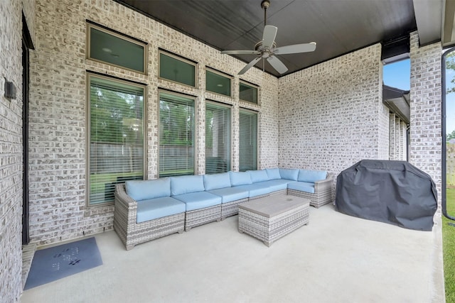 view of patio / terrace featuring ceiling fan, a grill, and an outdoor hangout area