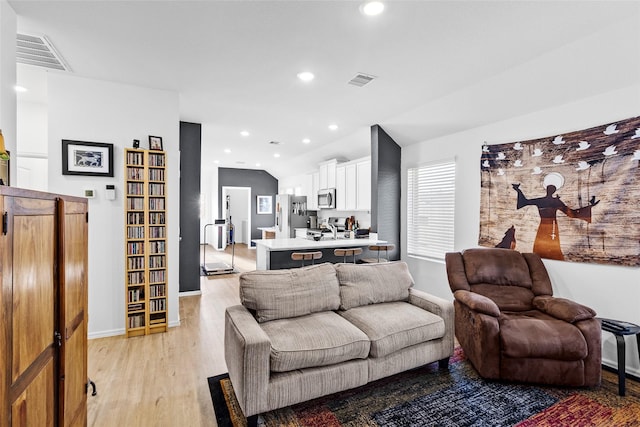 living room featuring light wood-type flooring