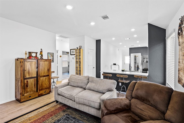 living room with hardwood / wood-style flooring