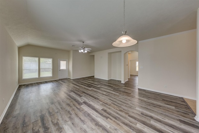 unfurnished living room featuring hardwood / wood-style floors, ceiling fan, and crown molding