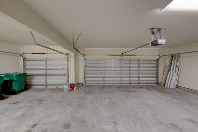 garage featuring a garage door opener