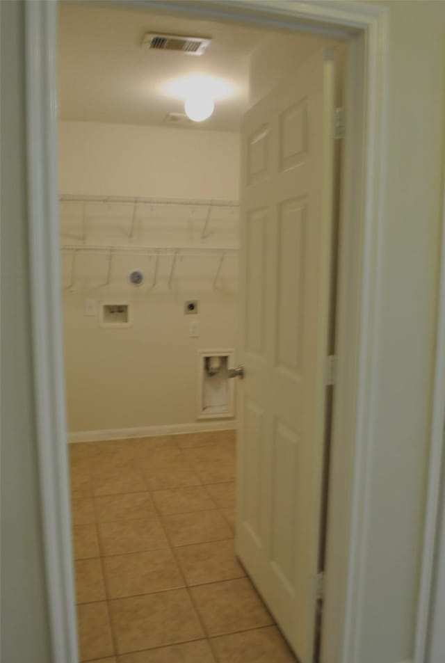 washroom featuring washer hookup, light tile patterned floors, visible vents, hookup for an electric dryer, and laundry area