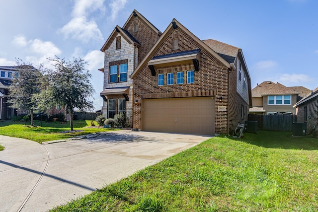 view of front of property featuring central AC unit, a front yard, and a garage