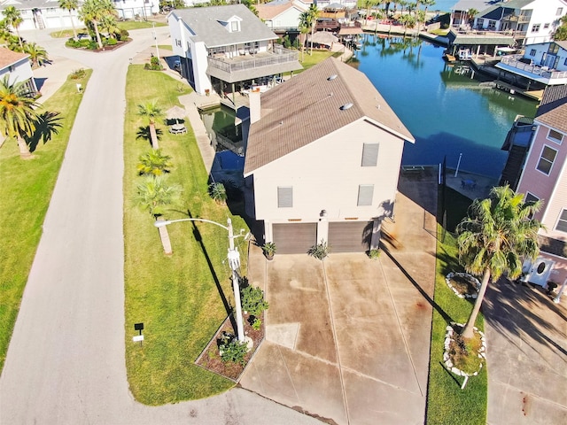 drone / aerial view with a water view