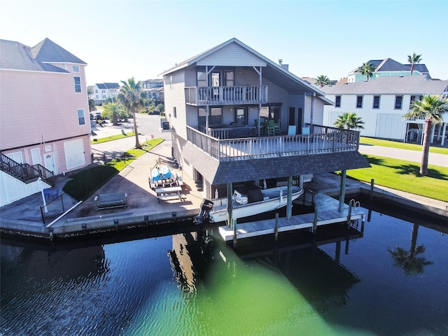 dock area with a water view