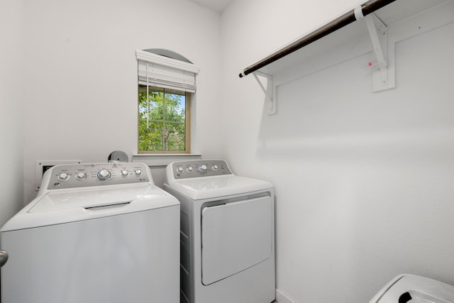 laundry area with washer and dryer