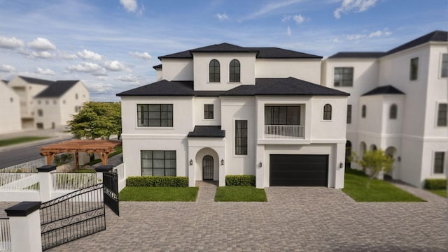 view of front of property with a fenced front yard, a garage, decorative driveway, a residential view, and stucco siding