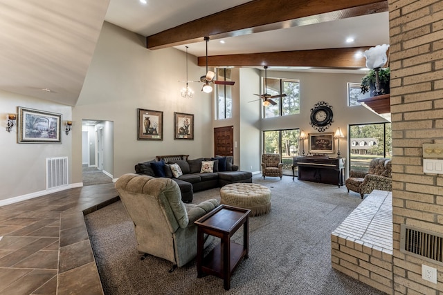 tiled living room featuring beamed ceiling, a towering ceiling, and ceiling fan