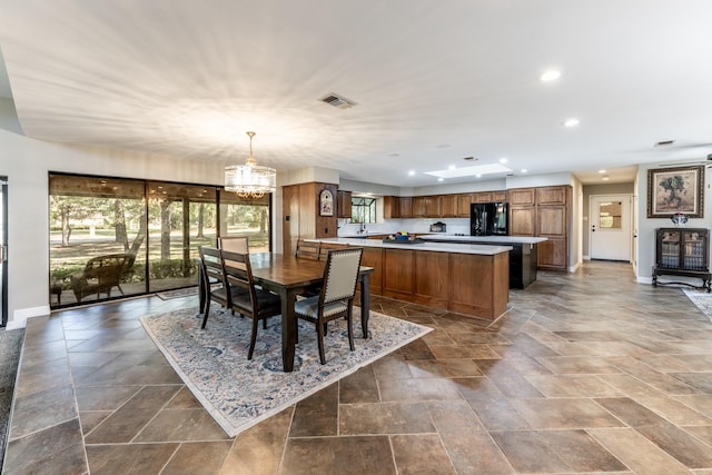 dining room with an inviting chandelier