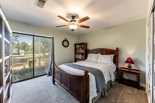 carpeted bedroom featuring ceiling fan