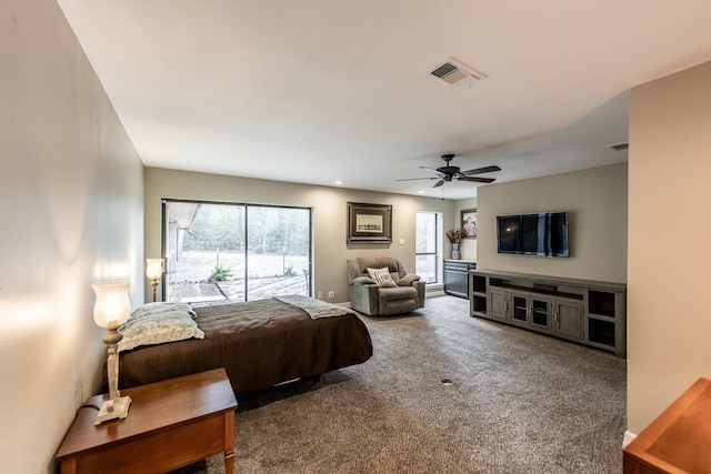 carpeted bedroom featuring ceiling fan and access to outside