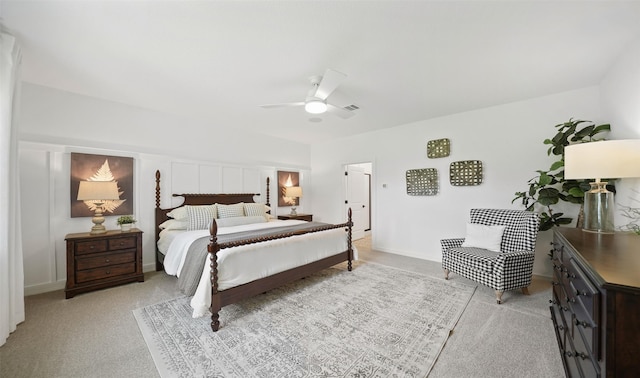 bedroom featuring light carpet and ceiling fan