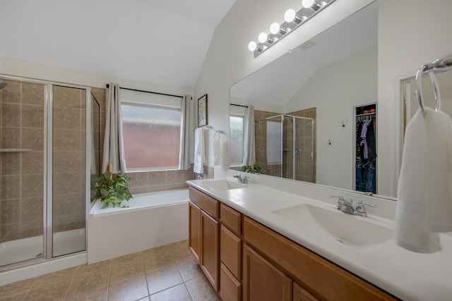 bathroom featuring separate shower and tub, tile patterned flooring, vanity, and lofted ceiling