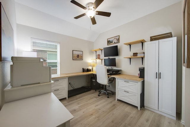 home office with light wood-type flooring, vaulted ceiling, and ceiling fan