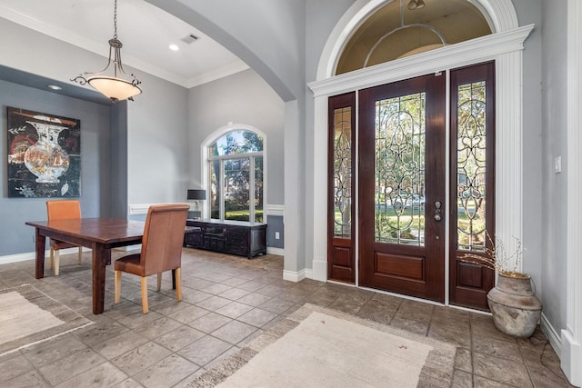 foyer with ornamental molding