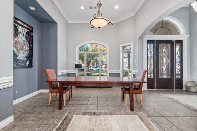 dining area featuring ornamental molding