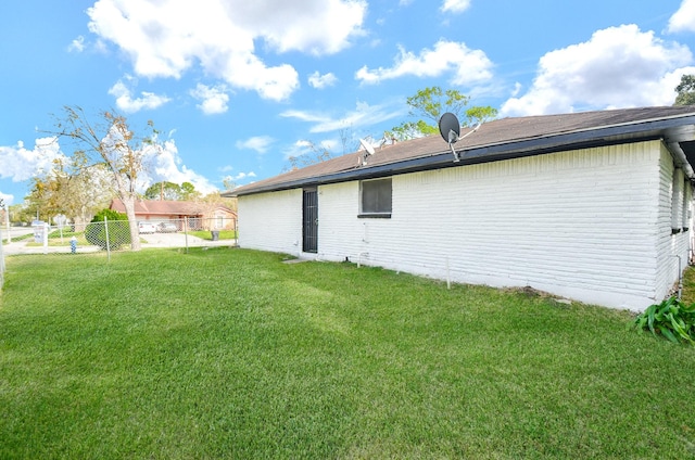 exterior space featuring a lawn