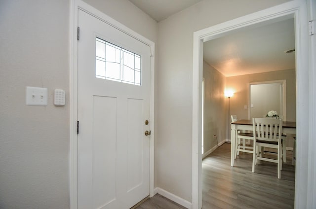 foyer featuring hardwood / wood-style floors