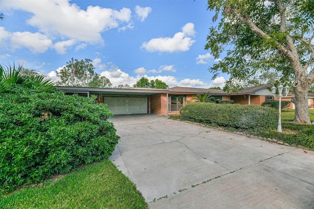 single story home featuring a garage