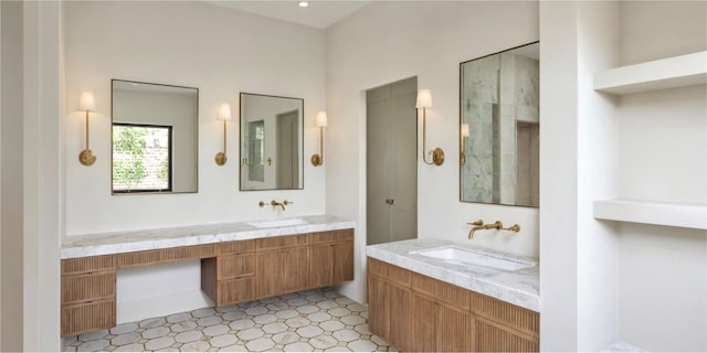 bathroom with vanity and walk in shower