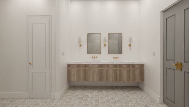 bathroom with baseboards and vanity