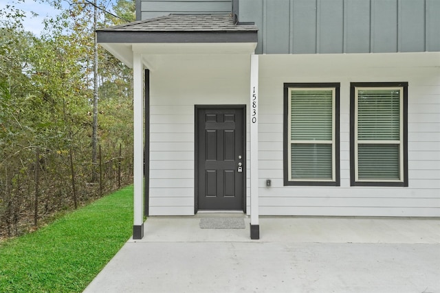 property entrance with covered porch