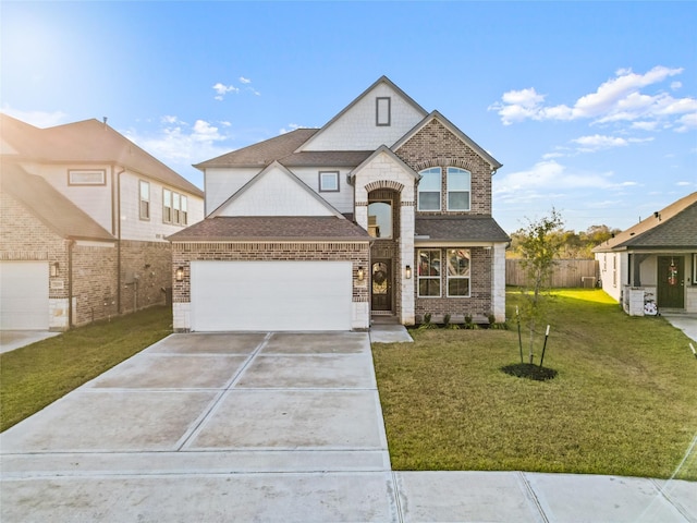 view of front facade featuring a front yard and a garage