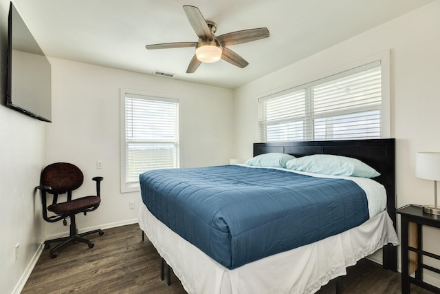 bedroom featuring dark wood-type flooring and ceiling fan