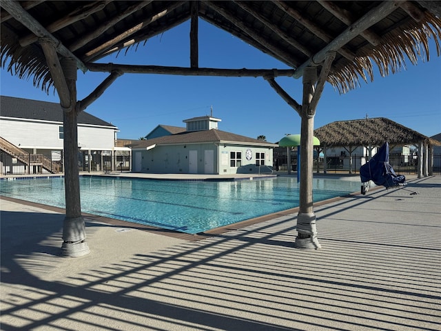 view of pool featuring a gazebo and a patio area