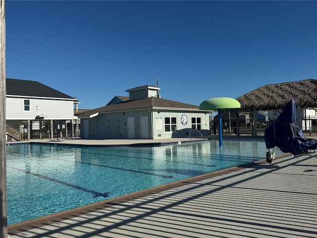 view of swimming pool featuring a patio area