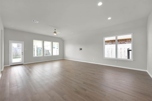 spare room with hardwood / wood-style floors and ceiling fan