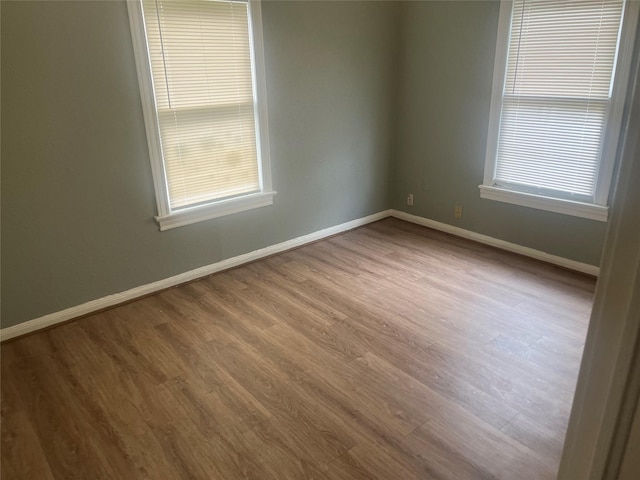 empty room featuring hardwood / wood-style floors