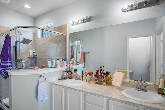 bathroom featuring vanity and walk in shower