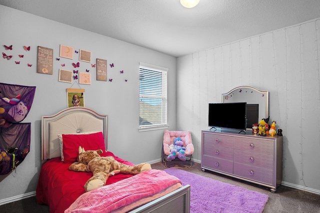 carpeted bedroom with wood walls