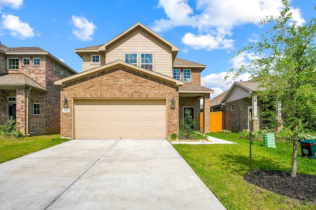 view of front of house featuring a front lawn and a garage