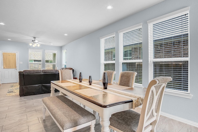 dining room featuring ceiling fan and light hardwood / wood-style floors