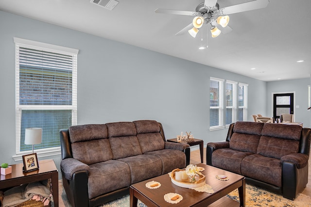 living room with ceiling fan