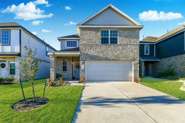 view of front of house with an attached garage, driveway, brick siding, and a front yard